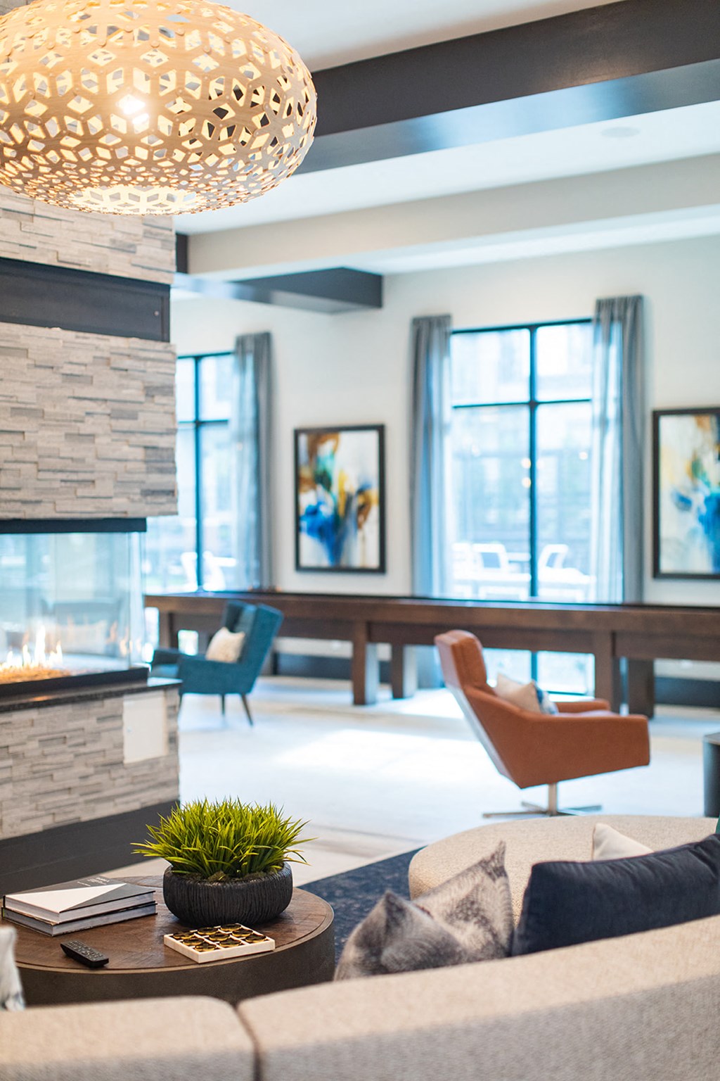 a living room with a couch and a coffee table and a fireplace at The Yards at Malvern, Malvern, PA