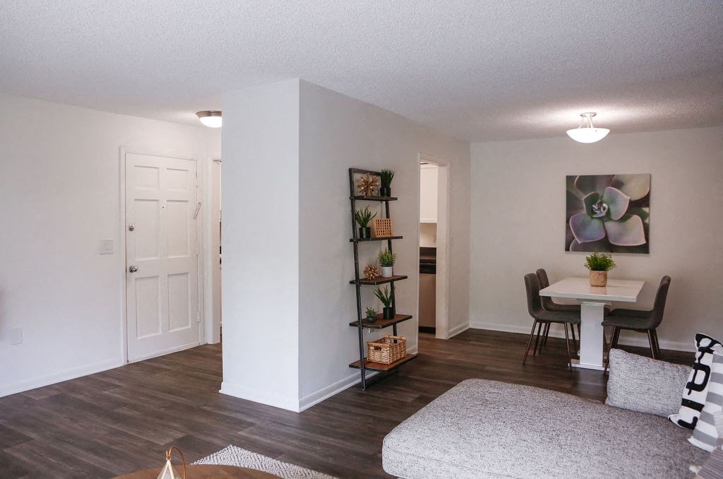 a view of the living room and dining room of a 560 square foot, 1 bedroom apartment  at The Villas at Flagler Pointe, Saint Petersburg, FL