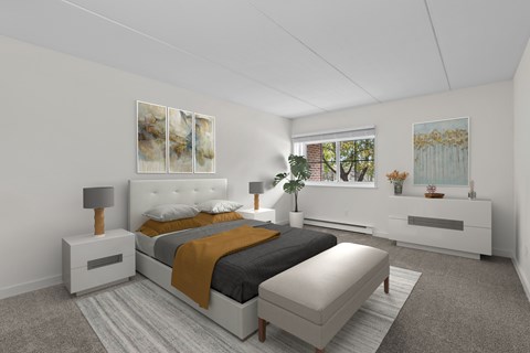 A bedroom with a large bed and a bench.