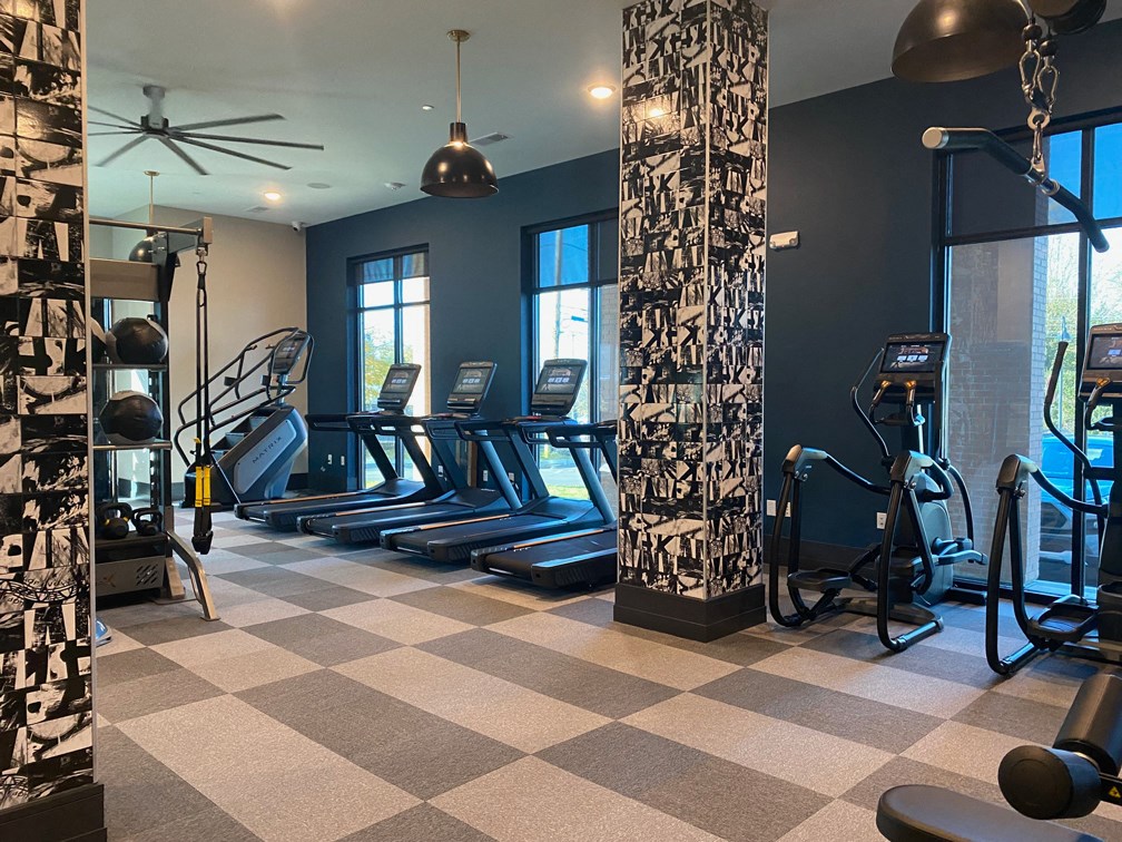 a gym with cardio machines and weights on the floor at The Yards at Malvern, Malvern, PA