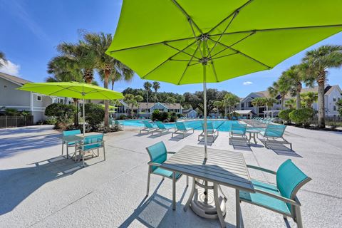 Poolside Dining Tables  at The Monroe Apartment Homes, Tallahassee, FL