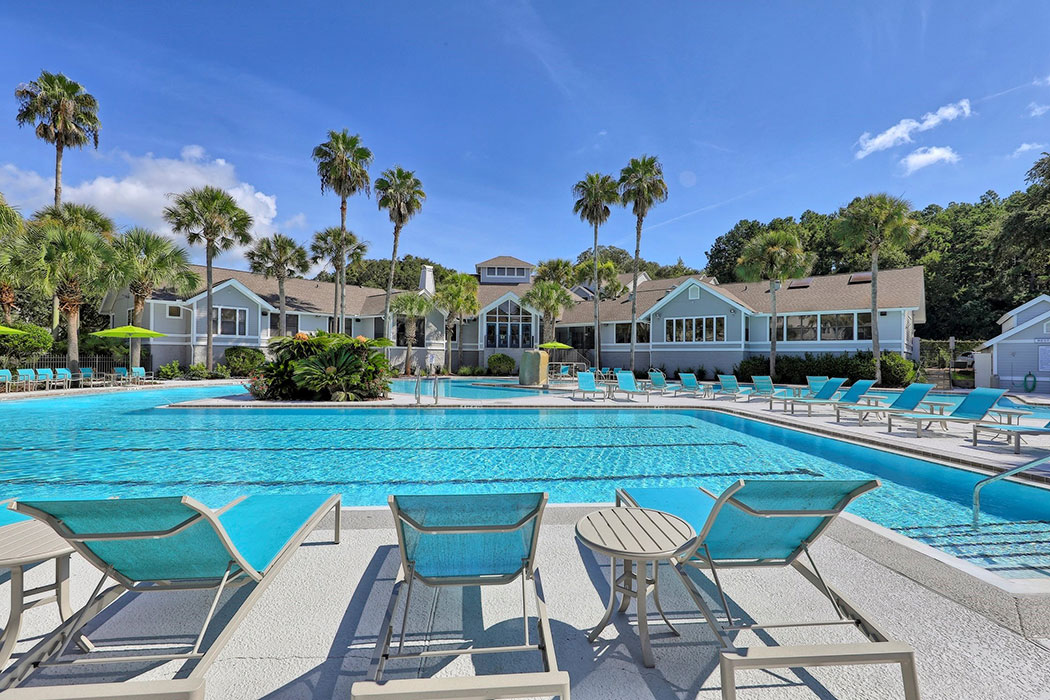 Pool With Sunning Deck  at The Monroe Apartment Homes, Tallahassee, FL, 32303