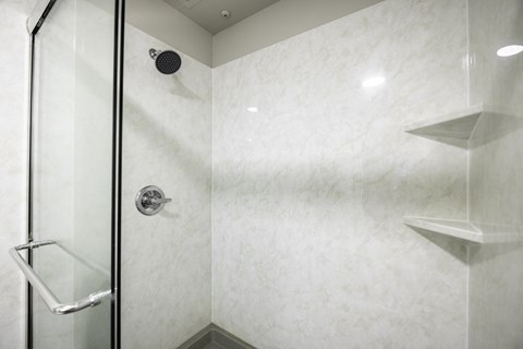 a large walk-in shower at Prestonwood Hills Texas, 75093