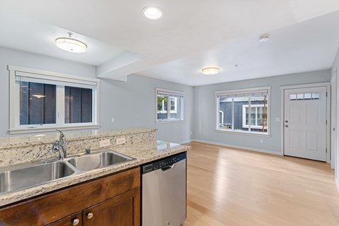 the kitchen and living room are spacious and open to the living room