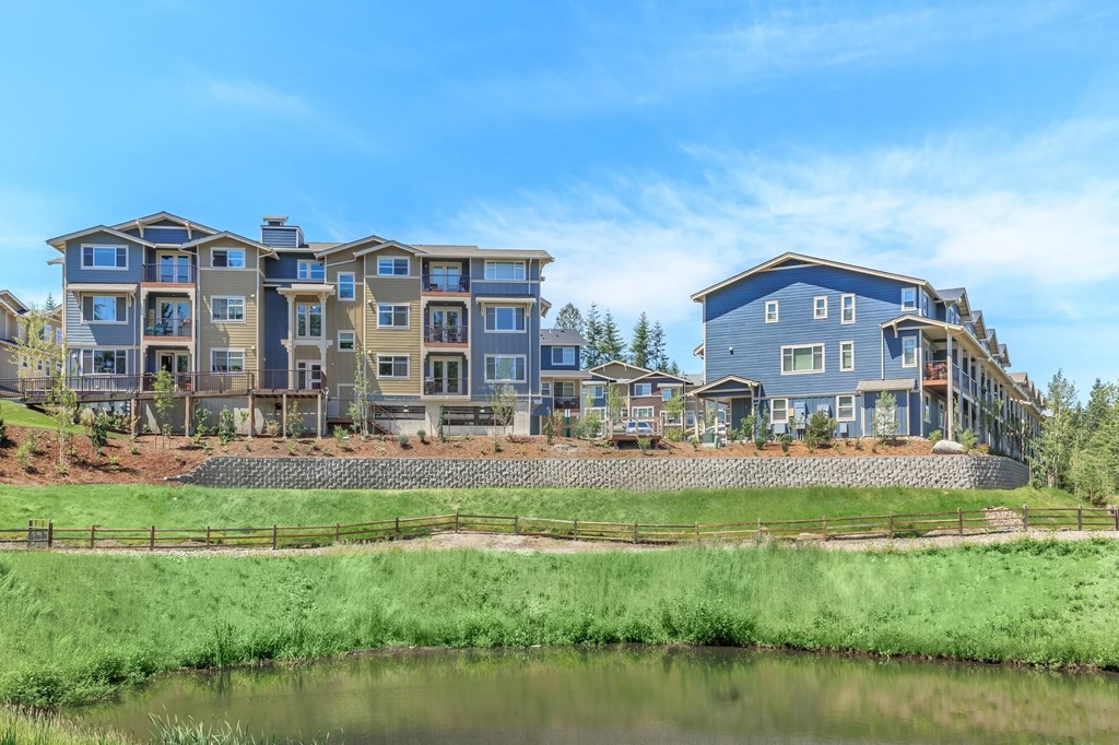 a large building next to a body of water