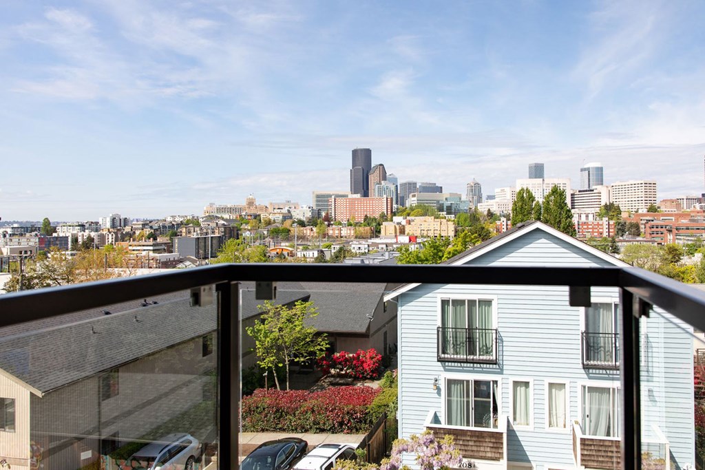 a balcony with a view of the city