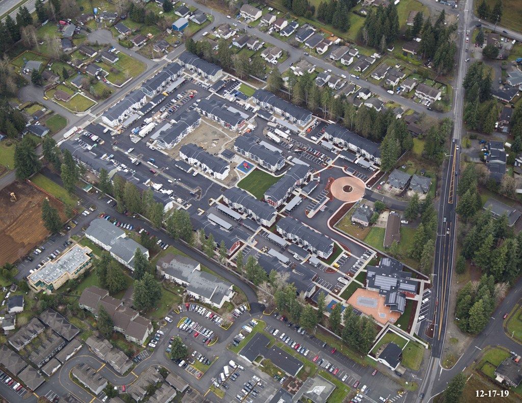 an aerial view of a parking lot in a city