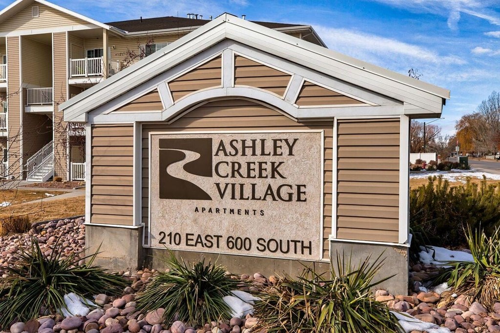 a sign on the side of a house