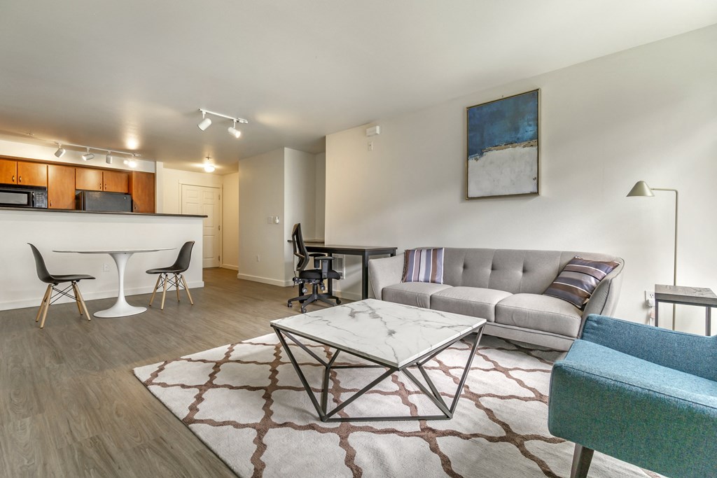 a living room with a couch and a table
