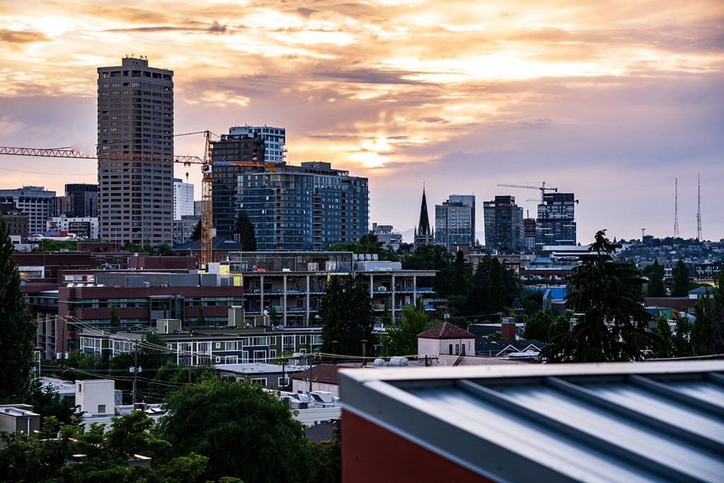 a view of the city skyline at sunset