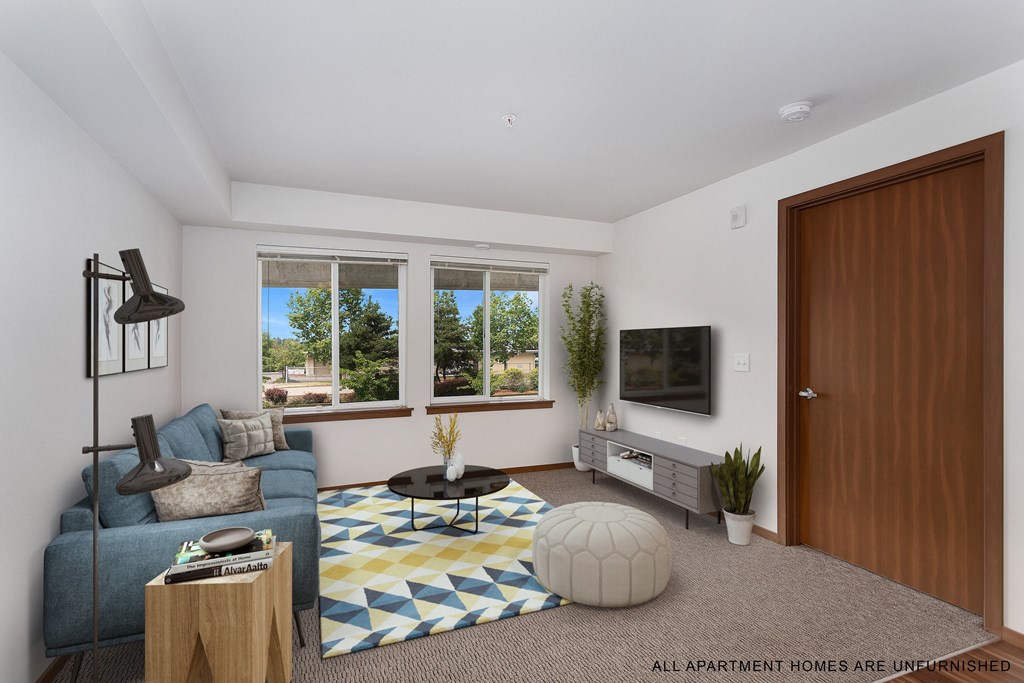 an artist rendering of a living room with a blue couch and a tv