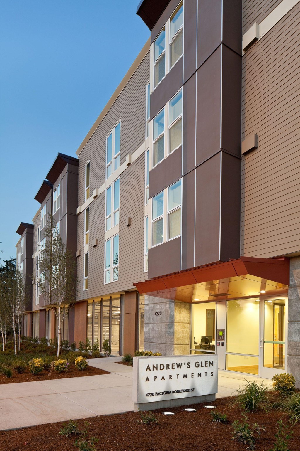A modern apartment building named Andrew's Glen Apartments.