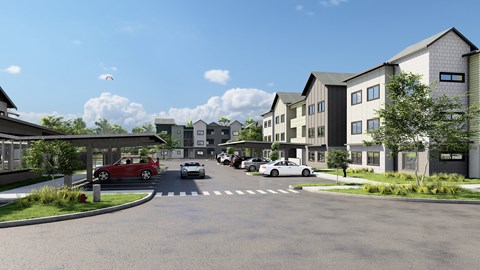 A street view of a residential area with cars and houses.