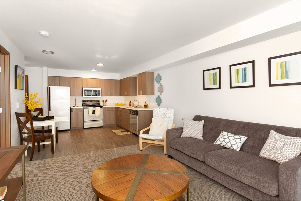 a living room with a couch and a table