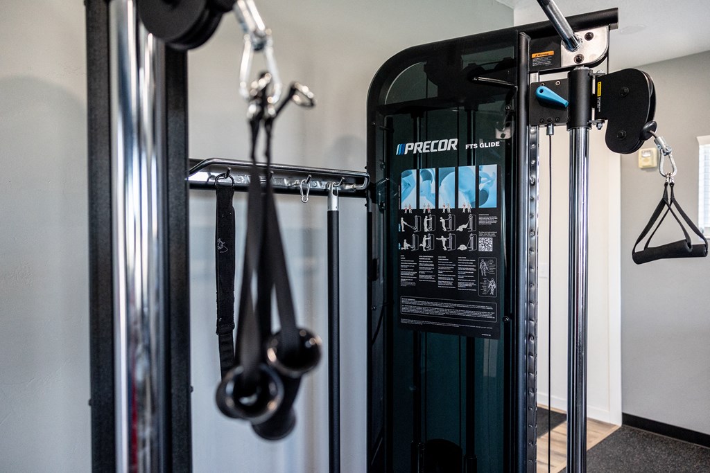 A close up of a PRECORD gym machine.