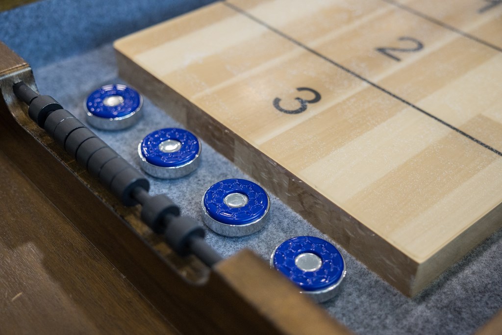 A game board with numbers 3 and 2 on it.