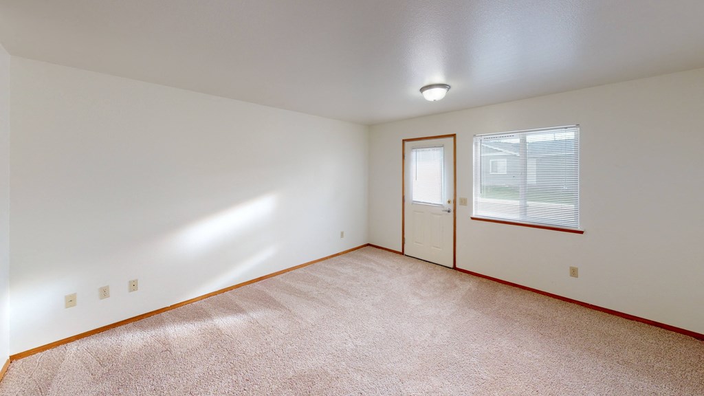 the spacious living room is clean and ready for you to use