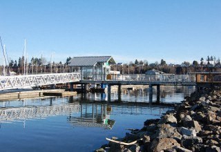 a bridge over a body of water with a dock