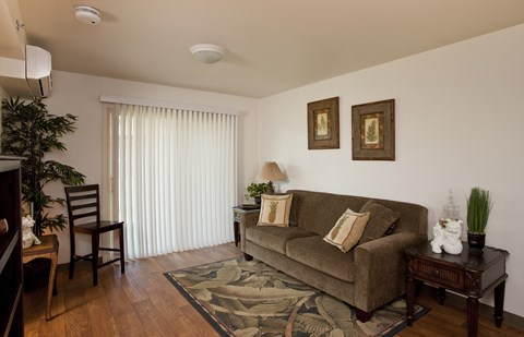 a living room with a couch and a table