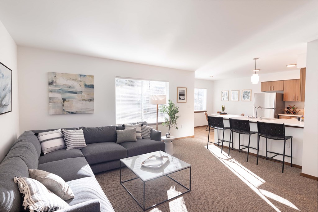 a living room with a couch and a table