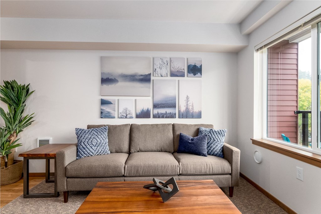 a living room with a couch and a coffee table