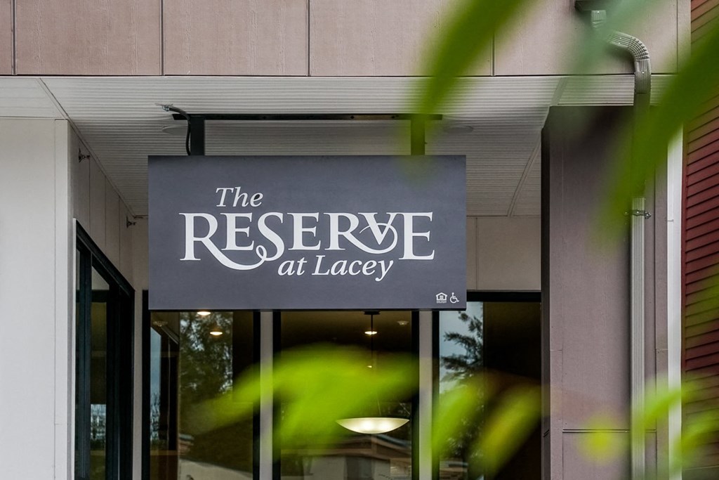 the reserve at legacy signage at the front of the building