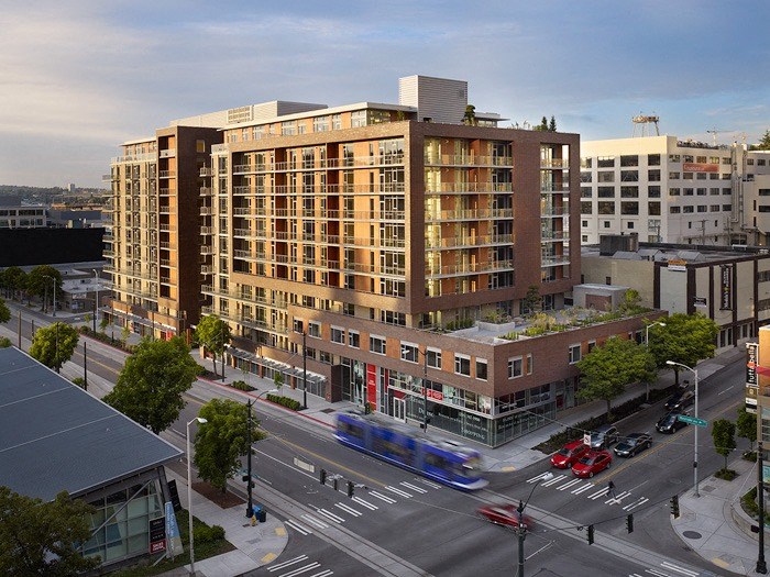 an aerial view of a building on a city street
