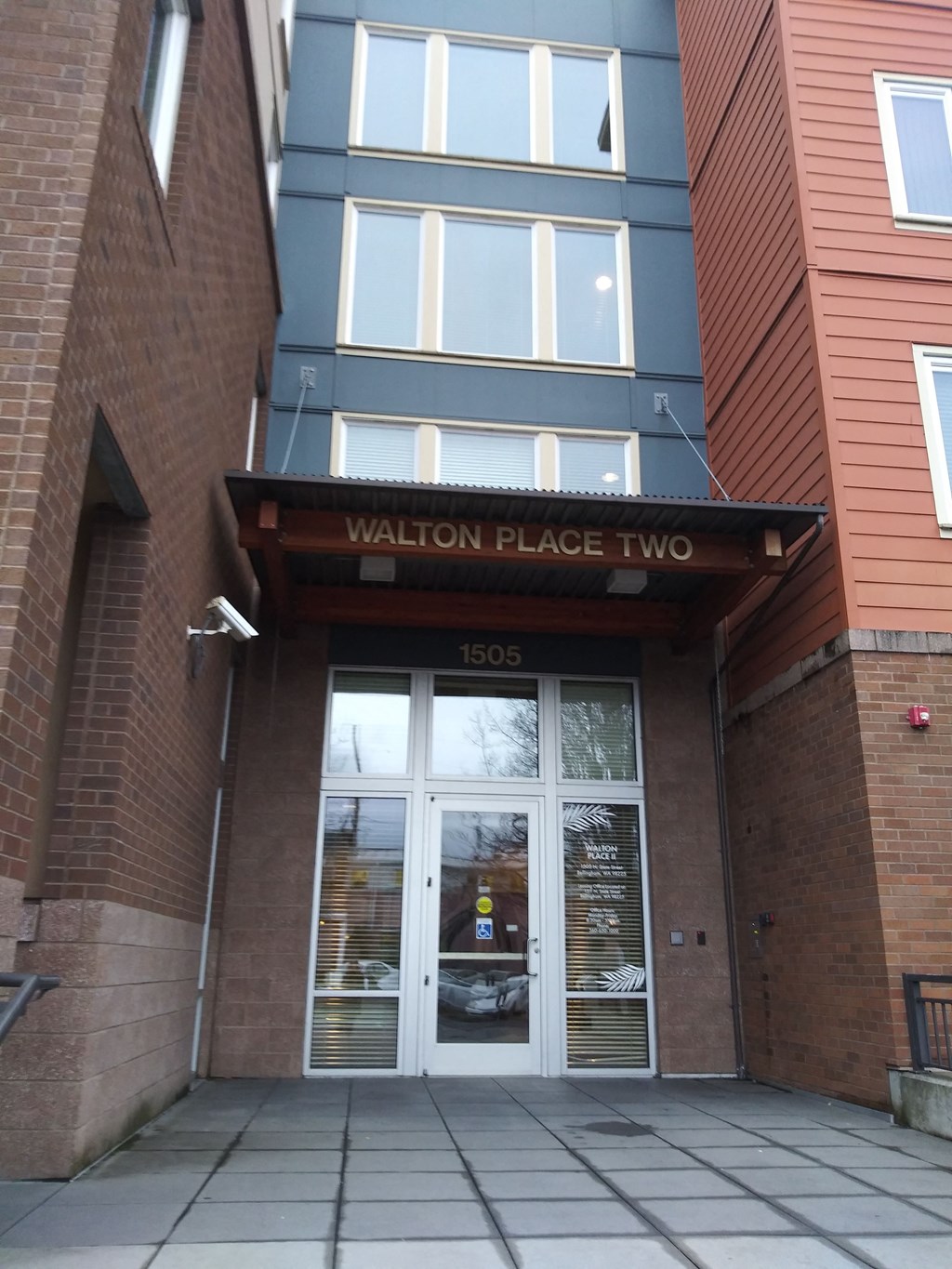 the entrance to the place two building