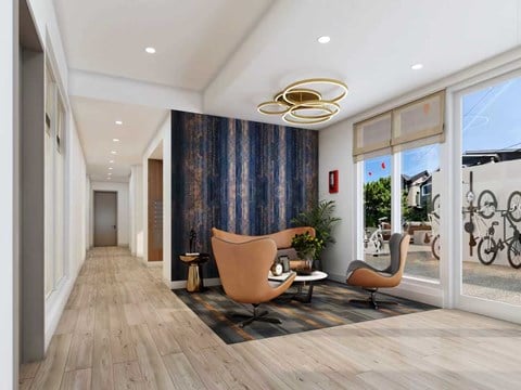 A modern living room with a blue curtain and wooden flooring.