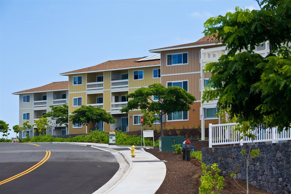 a large building with a street in front of it