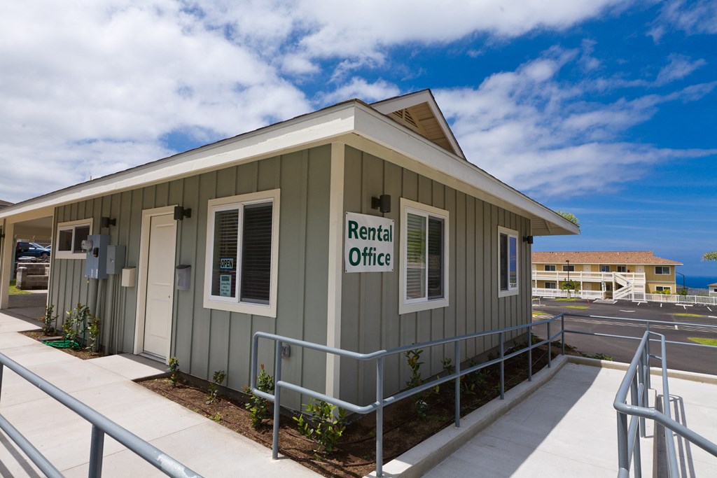 the rental office is available for rent on the side of the building