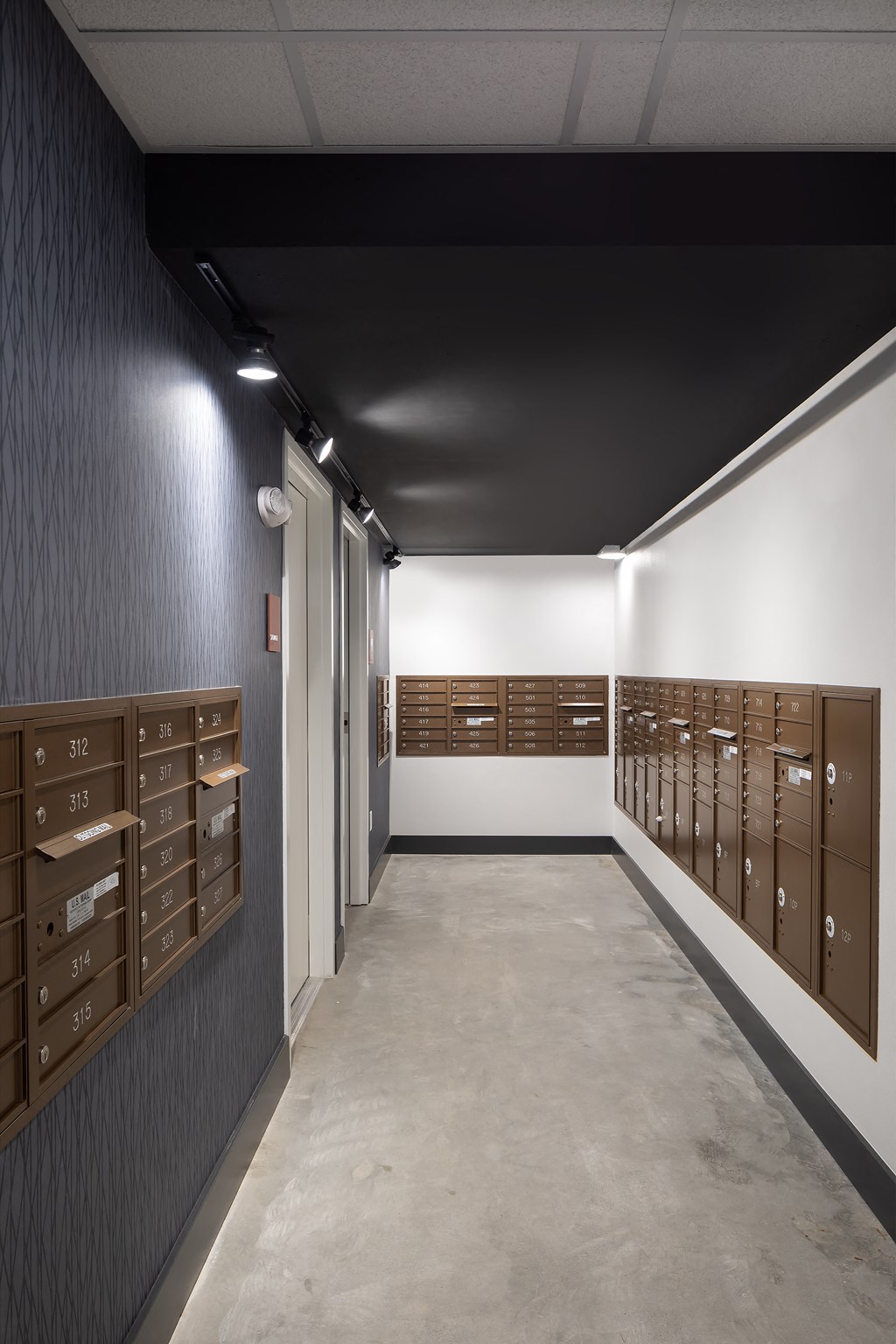 a locker room with vaulted ceilings and wooden lockers