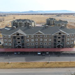 an aerial view of a large apartment building