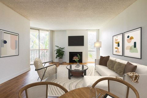 a living room with a couch and a table and a fireplace