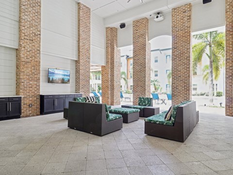 Lobby with seating and a television  at Park Place, Oviedo, FL, 32765
