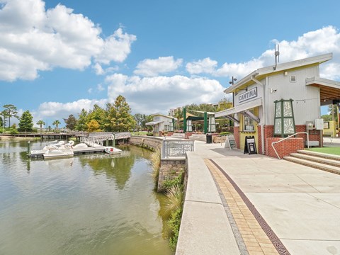 Building with a boat dock on the water  at Park Place, Oviedo, FL, 32765