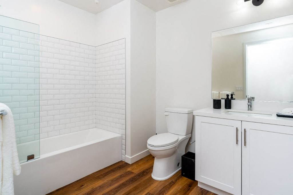 Walk-In Showers With Built-In Bench And Glass Enclosure at Fedora Bliss LLC, Woodland Hills, 91367