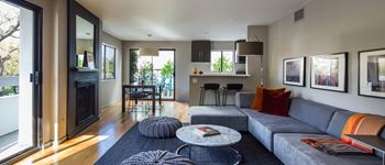 Living room with a couch and a coffee table at 888 Hilgard – Furnished Apartments, Los Angeles