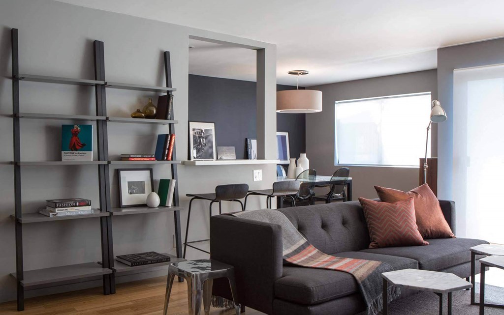 Living Room With Workspace at 888 Hilgard – Furnished Apartments, California