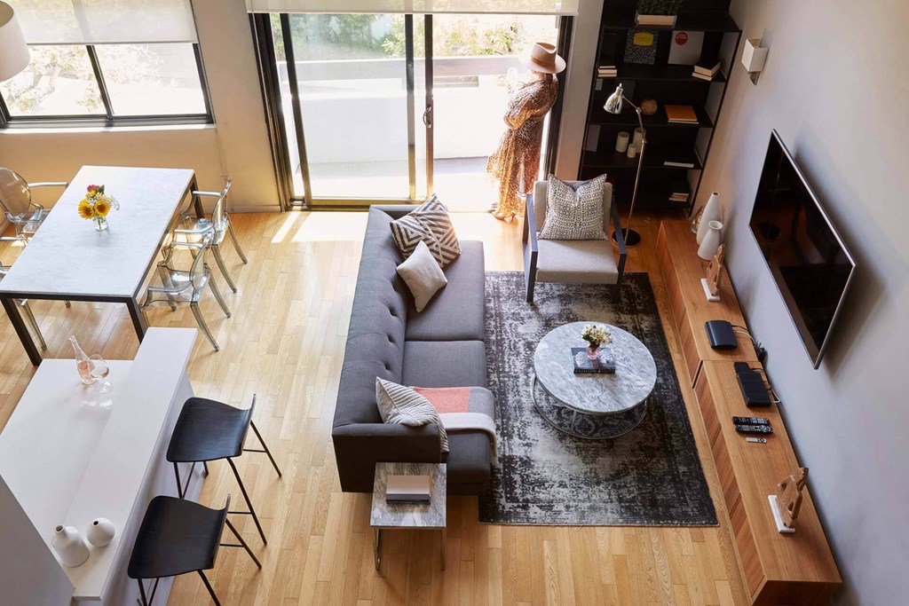 Aerial View Of Living Room And Kitchen at 888 Hilgard – Furnished Apartments, Los Angeles, California