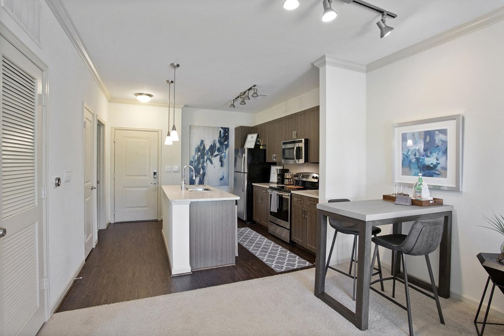 furnished kitchen and dining area in apartment home  at The Brookhaven Collection, Atlanta