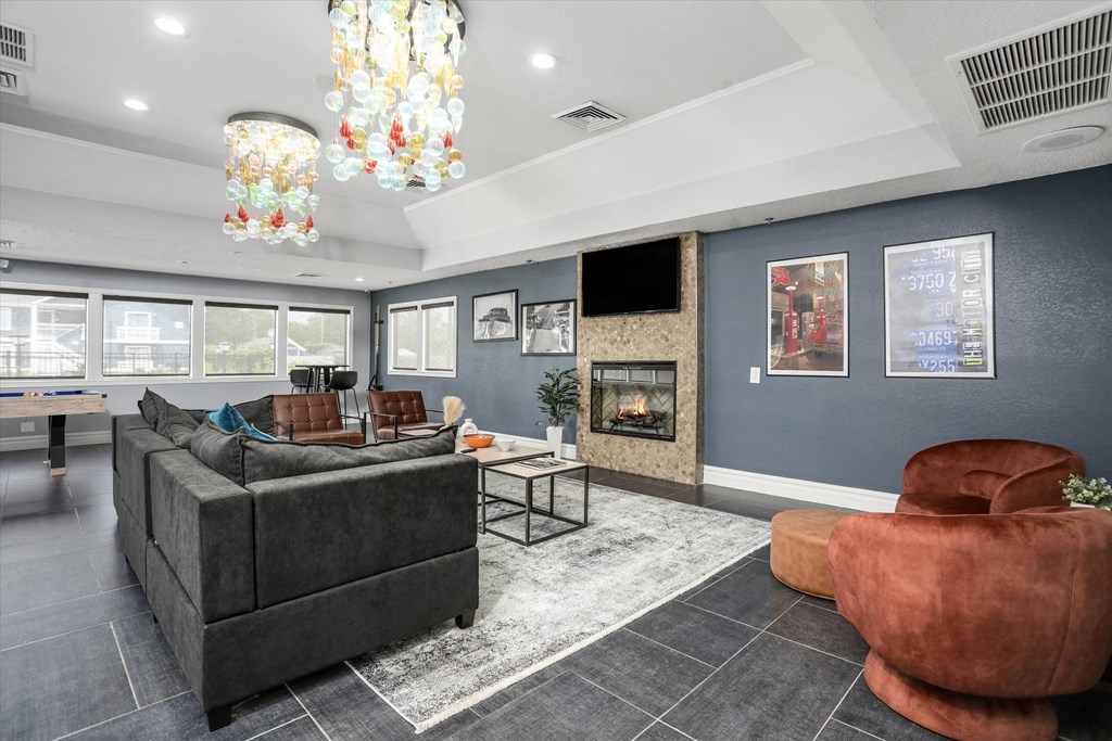 the retreat apartments l living room with fireplace and couches