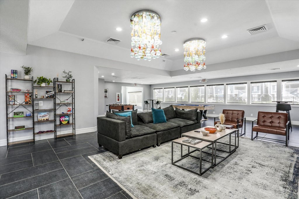 the preserve at ballantyne commons living room with couches and tables