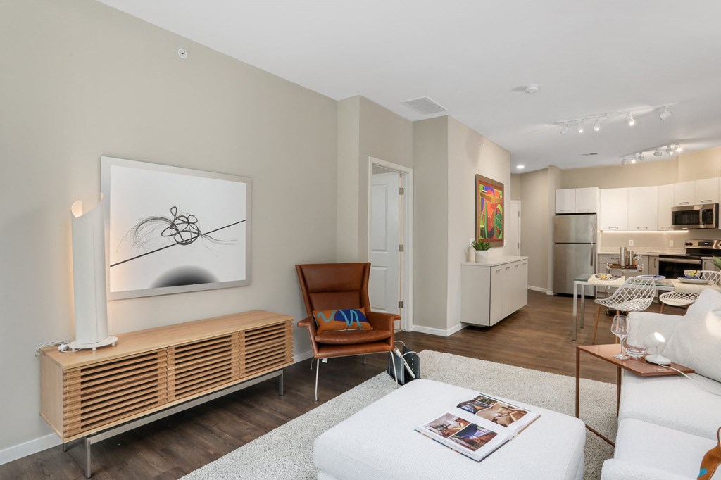 a living room with a couch and a table