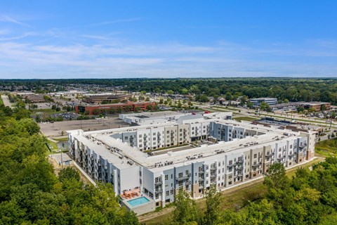 an aerial view of an apartment building in a city