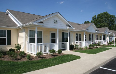 A row of houses numbered from 16 to 18.