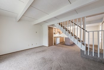 Carpeted Living Area Carpeted Living Area at Chatham Village Apartments, Ohio - Photo Gallery 5