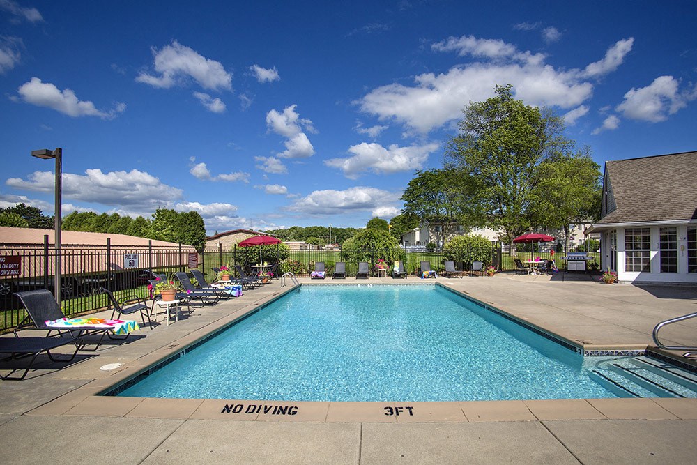 A pool with a no diving sign in the water.
