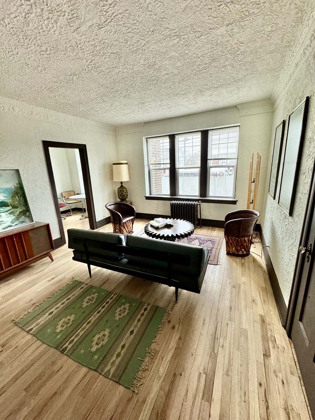 a living room with a couch and a table