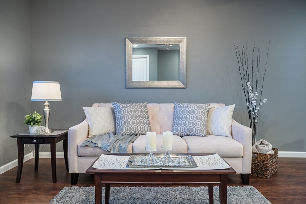 a living room with a couch and a coffee table